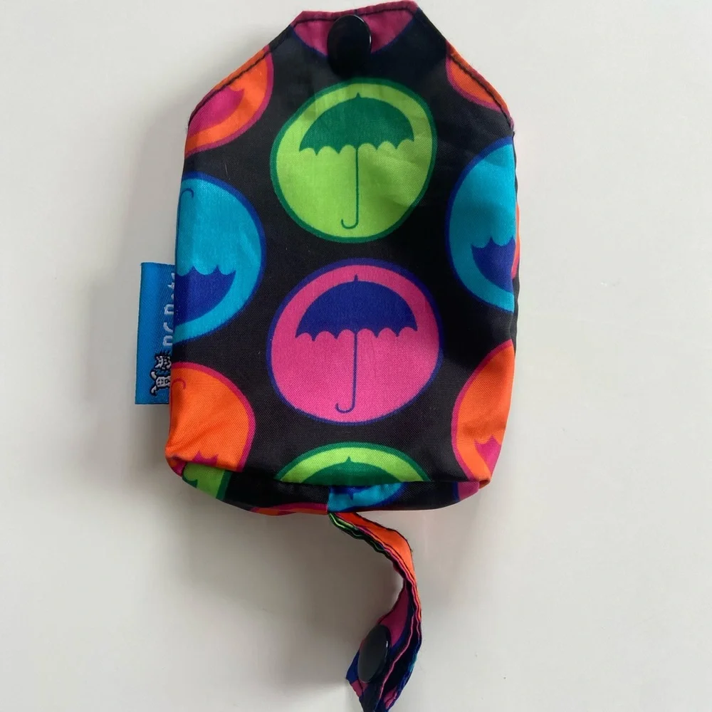 Waterproof Packable Rain Poncho for your dog. Lightweight and adjustable.